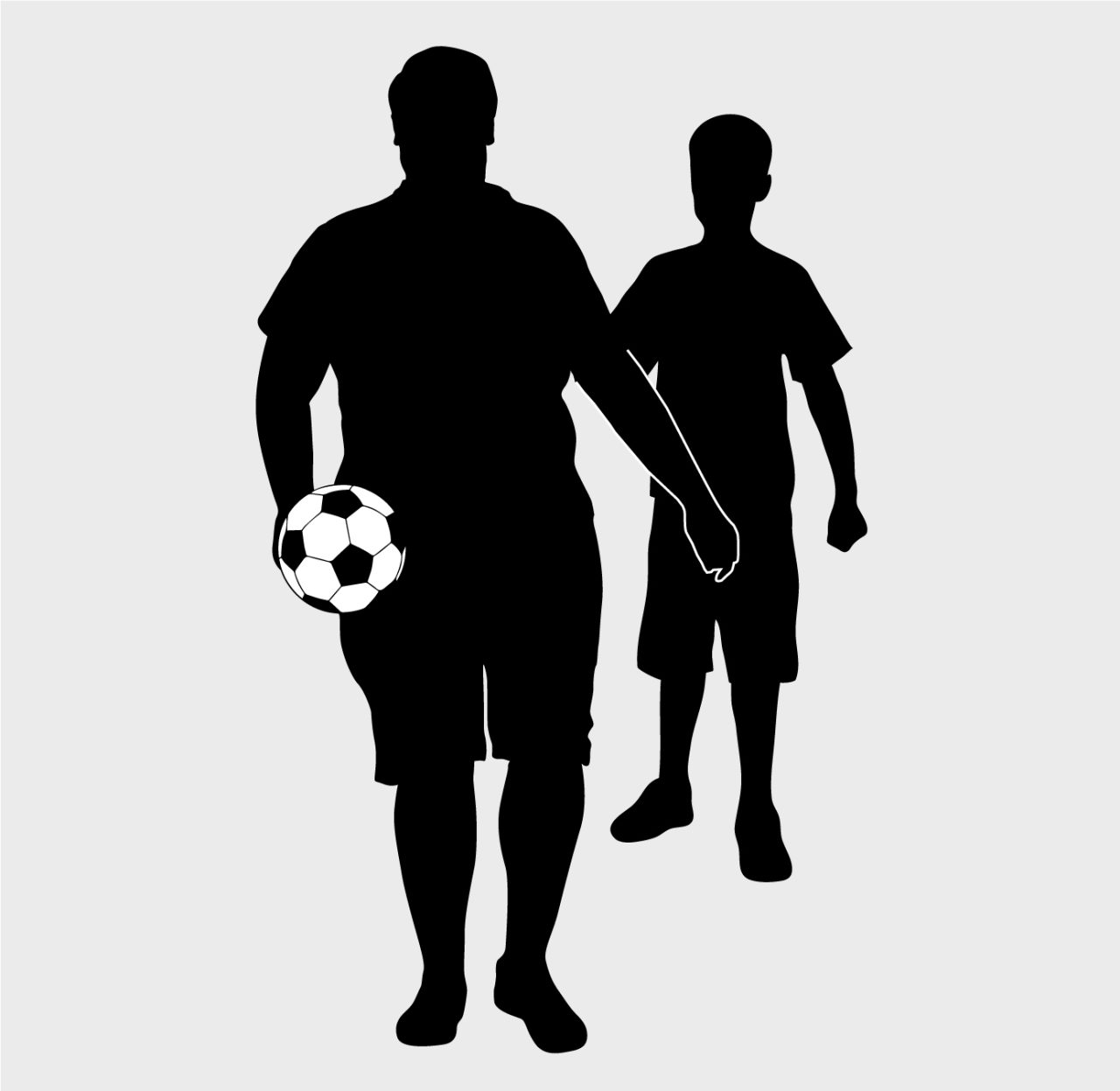 Silhuet - voksen med fodbold og barn